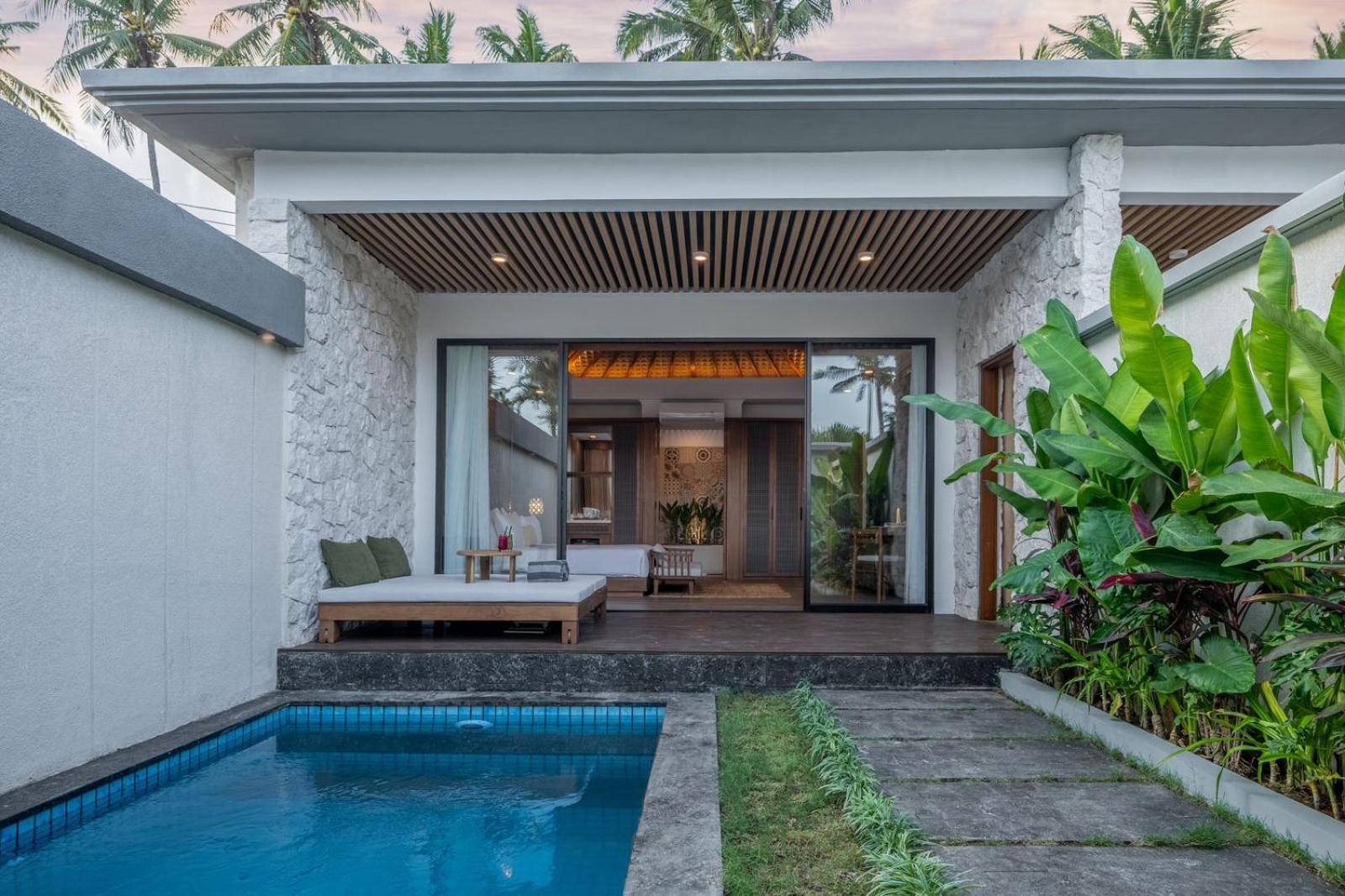 Nirwana Beach & Resort Candidasa Exteriör bild A pool villa at the resort